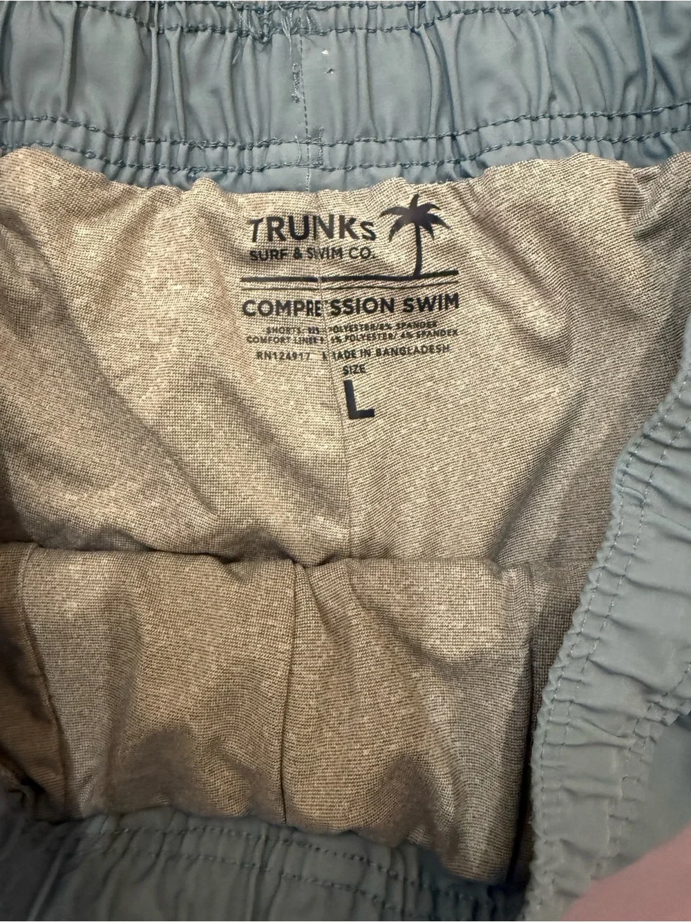Men's Two-Tone Blue and Lavender Swim Shorts. Compression lining